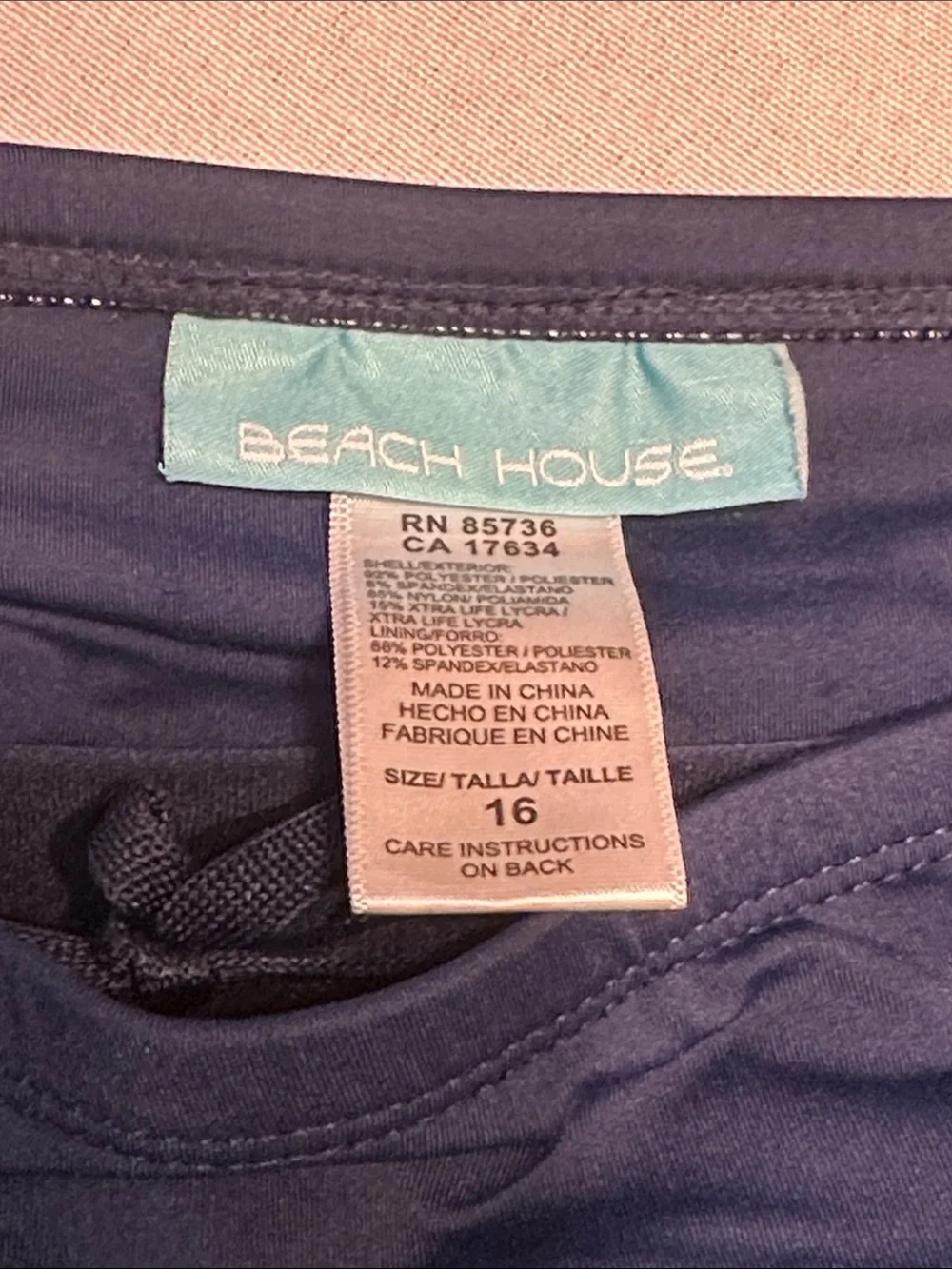 Beach House Navy Blue Swim Shorts with Drawstring, pockets and bottom.